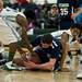 Rudolf Steiner Steven Molitor and Arbor Prep Tariq Stinson compete for possession in the game on Tuesday, Jan. 22. Daniel Brenner I AnnArbor.com